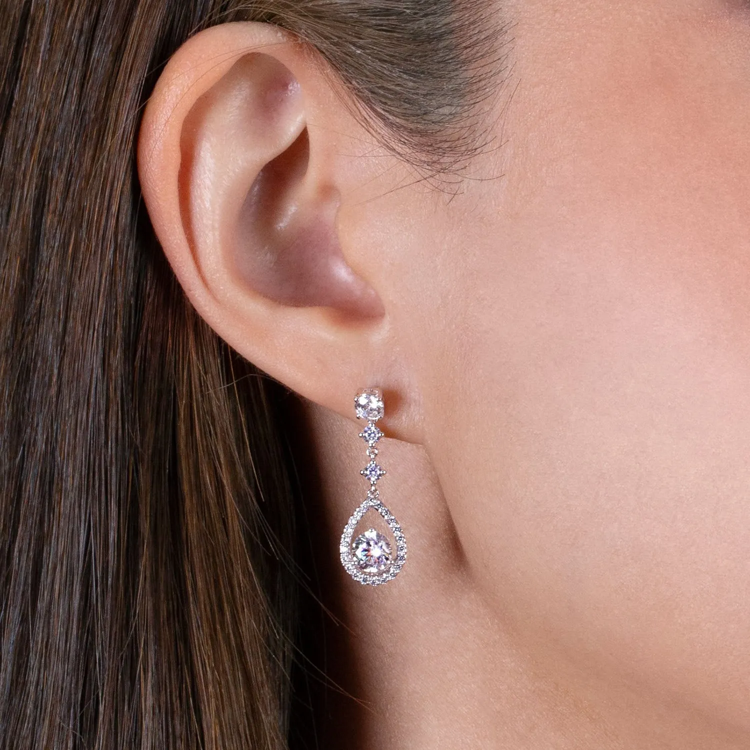 Regalia: Silver rhodium plated with 5.5mm CZ millenia pear drop earrings