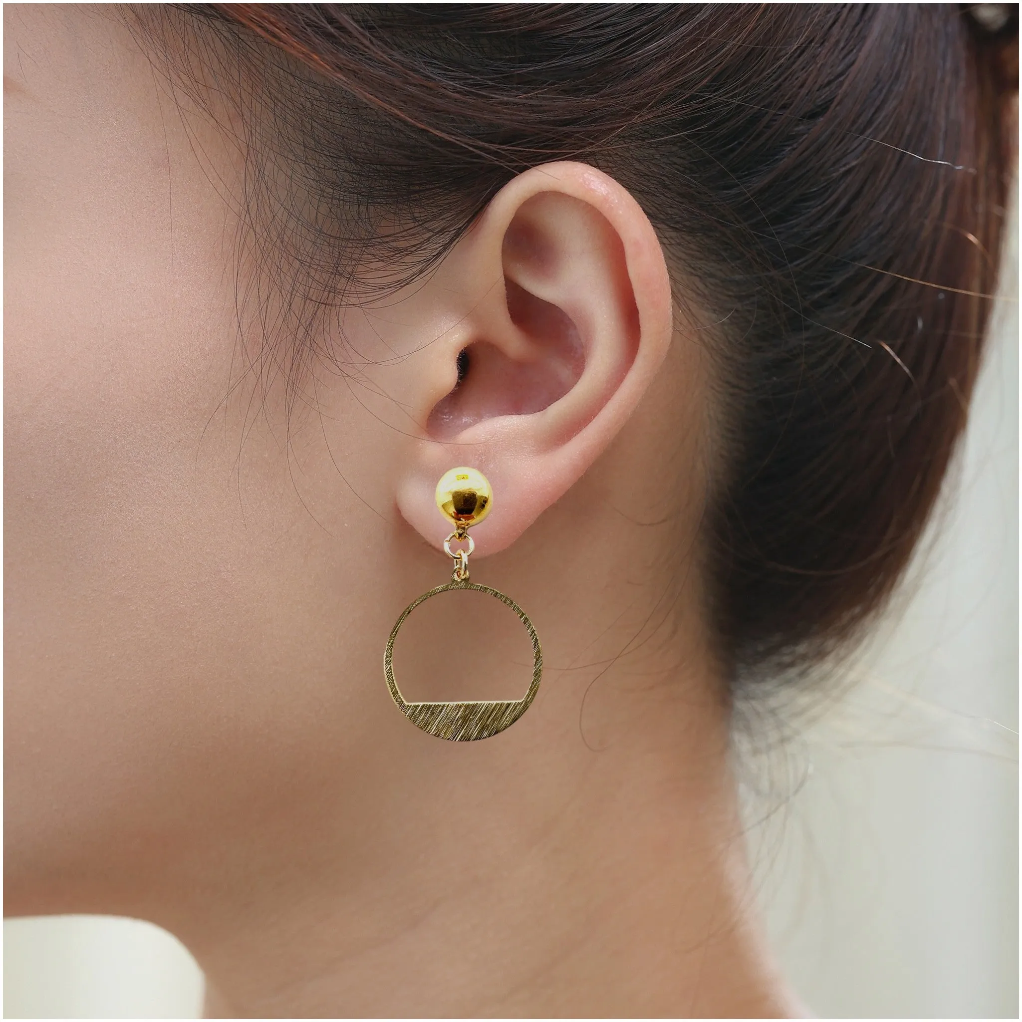 Ti-Go Golden rings earring